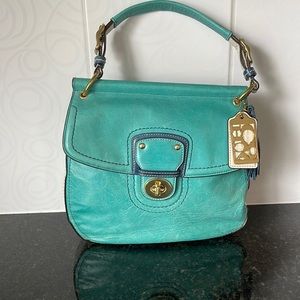 COACH teal and white leather hand bag with optional strap.